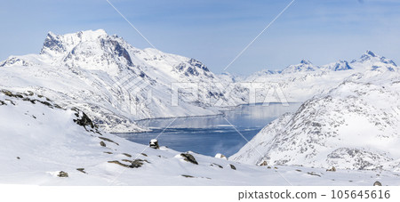 Greenlandic ice cap winter Sermitsiaq mountain and sea fjord panorama, Nuuk, Greenland 105645616