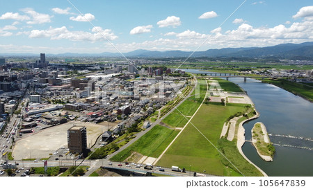 Aerial view of Kurume City from the Chikugo River in Fukuoka Prefecture with a drone 105647839