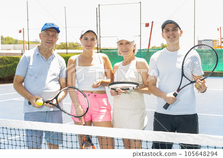 Tennis family or friends. 105648294