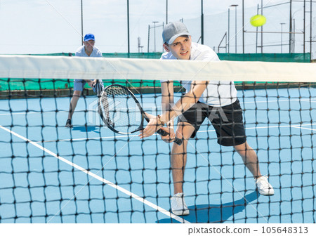 Sportsman ready to hit volley. 105648313