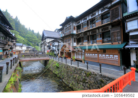 Taisho Roman Ginzan hot spring town waking up with summer morning fog Taisho Roman Ginzan hot spring town waking up with summer morning fog 105649502