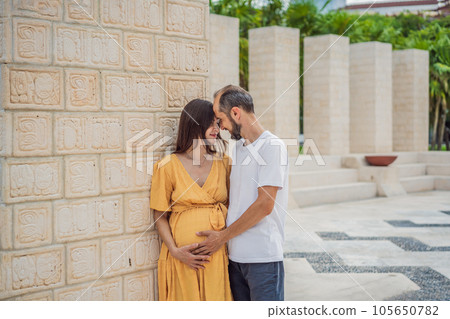 A loving couple in their 40s cherishing the miracle of childbirth in Mexico, embracing the journey of parenthood with joy and anticipation 105650782