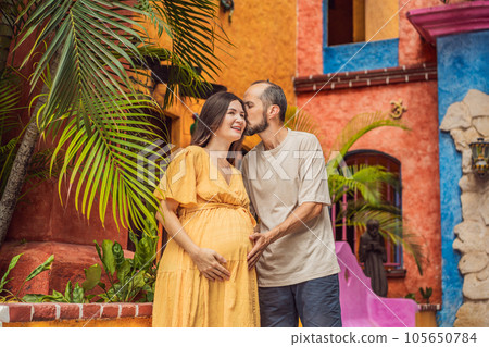 A loving couple in their 40s cherishing the miracle of childbirth in Mexico, embracing the journey of parenthood with joy and anticipation 105650784