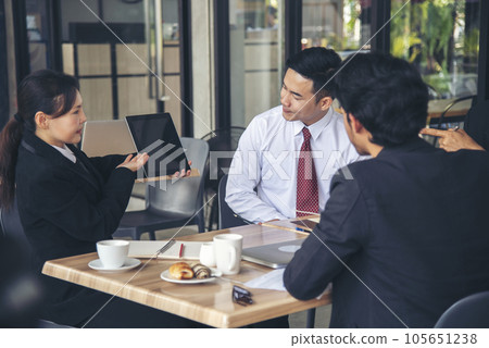 Team Business Partners shaking hands together to Greeting Start up small business in meeting room. Shakehand teamwork partners at modern office handshake together. Business mergers and acquisitions 105651238