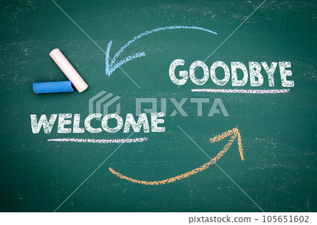WELCOME and GOODBYE concept. Colored pieces of chalk on a green chalkboard background WELCOME and GOODBYE concept. Colored pieces of chalk on a green chalkboard background 105651602
