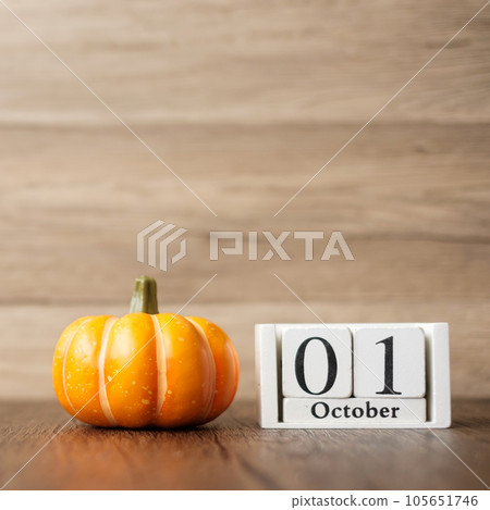 Happy Halloween day with pumpkin and 1 October calendar. Trick or Threat, Hello October, fall autumn, Festive, party and holiday concept Happy Halloween day with pumpkin and 1 October calendar. Trick or Threat, Hello October, fall autumn, Festive, party and holiday concept 105651746