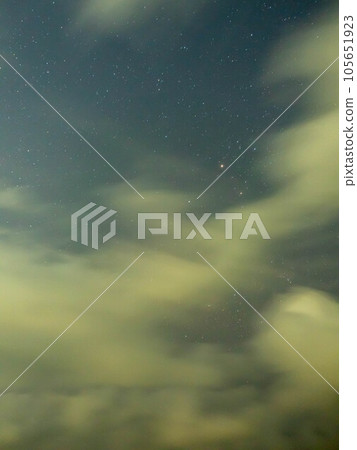Sunrise twilight sky at sea beach with tree under sea water in morning 105651923