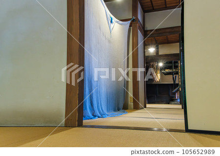 Mosquito net and hearth edge 105652989