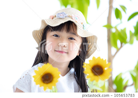 Girl's portrait A girl holding a sunflower Girl's portrait A girl holding a sunflower 105653783