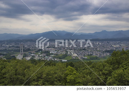View of Chichibu City and the Chichibu Mountain Range from the Chichibu Muse Park Observatory.Ogano Town, Chichibu City, Saitama Prefecture. 105653937