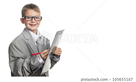 Child in business suit and glasses as businessman is writing on clipboard Child in business suit and glasses as businessman is writing on clipboard 105655187