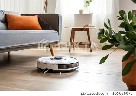 Modern autonomous vacuum cleaner cleans the floor 105656073