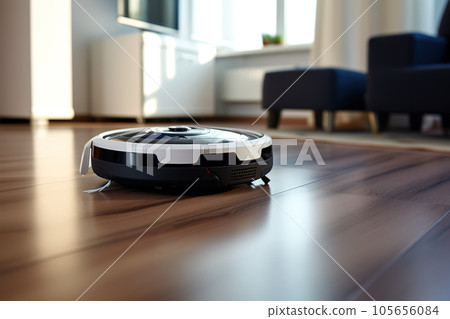 Modern autonomous vacuum cleaner cleans the floor Modern autonomous vacuum cleaner cleans the floor 105656084