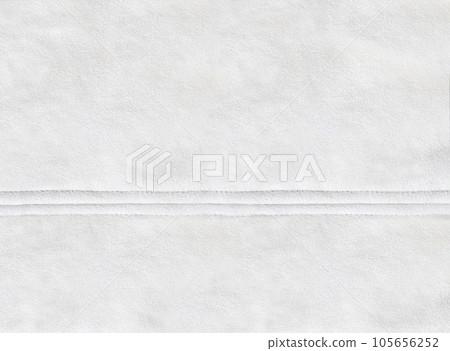 Horizontal or vertical backdrop with suede texture of ivory color. Background for scrapbooking design, decoration with suede leather and seam 105656252