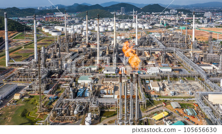 Aerial top view Oil and Gas refinery petrochemical plant industrial with oil and gas storage tank. White oil and gas refinery storage tank. Aerial view oil and gas refinery plant from industrial zone. Aerial top view Oil and Gas refinery petrochemical plant industrial with oil and gas storage tank. White oil and gas refinery storage tank. Aerial view oil and gas refinery plant from industrial zone. 105656630