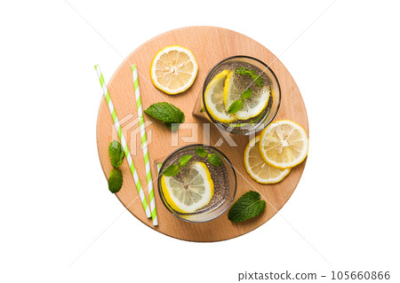 Healthy breakfast or morning with chia seeds lemon and mint on table background, vegetarian food, diet and health concept. Chia pudding with lemon and mint 105660866