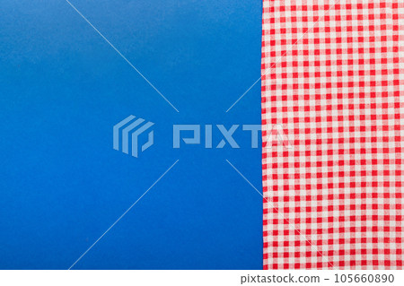 top view with red empty kitchen napkin isolated on table background. Folded cloth for mockup with copy space, Flat lay. Minimal style 105660890