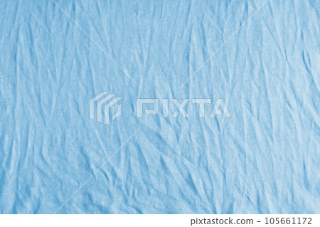 Wrinkled, crumpled blue jersey fabric texture background 105661172