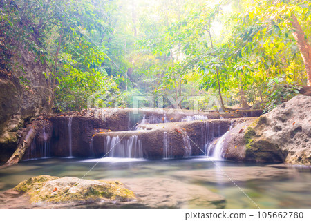 Waterfall in tropical landscape 105662780