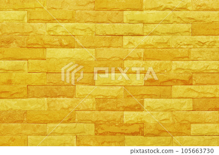 Golden yellow brick wall texture with vintage style pattern for background and design art work. Golden yellow brick wall texture with vintage style pattern for background and design art work. 105663730