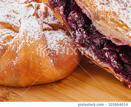 sweet and fresh cherry buns with red sweet jam sweet and fresh cherry buns with red sweet jam 105664014