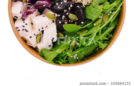 Healthy buddha bowl with quinoa, arugula, feta cheese and fruit 105664155