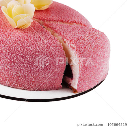 Pink cheese cake on white plate 105664219