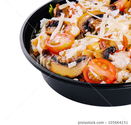 salad of fried mushrooms, tomatoes and parmesan 105664231