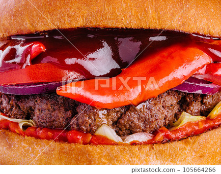 Tasty and appetizing hamburger cheeseburger closeup Tasty and appetizing hamburger cheeseburger closeup 105664266