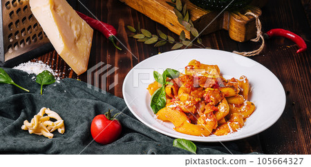 tagliatelle pasta on wooden with fabric background tagliatelle pasta on wooden with fabric background 105664327