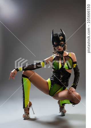 Sexy cat woman in trandy outfit on high heels Sexy cat woman in trandy outfit on high heels 105666550