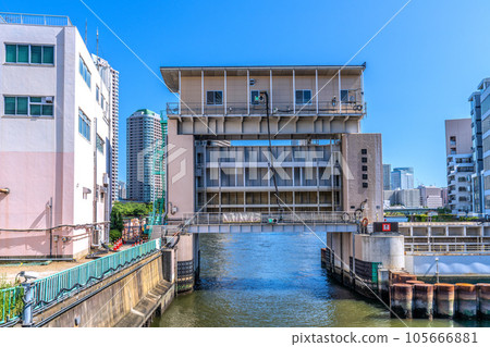 Cityscape of Tokyo, Japan View of the Kameshima River Floodgate from Minami Takahashi (to the far left of the floodgate is the direction of Okawabata River City 21) Cityscape of Tokyo, Japan View of the Kameshima River Floodgate from Minami Takahashi (to the far left of the floodgate is the direction of Okawabata River City 21) 105666881