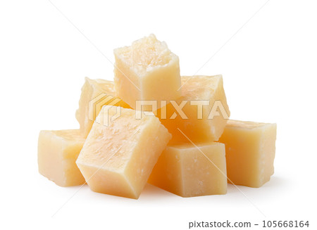 Pieces of parmesan cheese on a white background. Isolated Pieces of parmesan cheese on a white background. Isolated 105668164