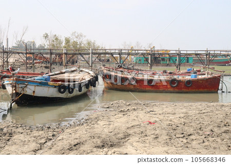 multiple colored wooden fishing boat multiple colored wooden fishing boat 105668346