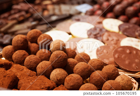 Chocolate truffle balls on market counter Chocolate truffle balls on market counter 105670195