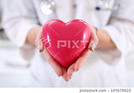 Female medicine doctor hands holding and covering Female medicine doctor hands holding and covering 105670828