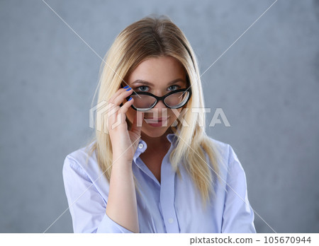 Portrait of a sexy woman in a man's shirt Portrait of a sexy woman in a man's shirt 105670944