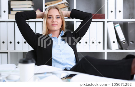 Business woman resting in the office after a working 105671292