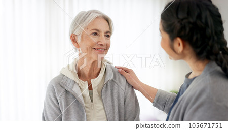 Consultation, physical therapy and senior woman with a nurse in a medical clinic or rehabilitation center. Healthcare, wellness and elderly female patient talking to a physiotherapist at a checkup. 105671751