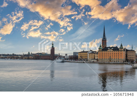 Stockholm Sweden, sunrise city skyline at Stockholm City Hall and Gamla Stan Stockholm Sweden, sunrise city skyline at Stockholm City Hall and Gamla Stan 105671948