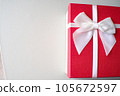 Valentine present. Gift box and red ribbon for romantic couple.Gift box and ribbon with tag for valentine present 105672597
