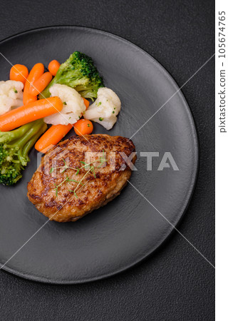 Delicious fresh fried minced fish cutlets with spices and herbs Delicious fresh fried minced fish cutlets with spices and herbs 105674765