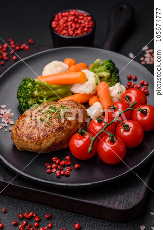 Delicious fresh fried minced fish cutlets with spices and herbs Delicious fresh fried minced fish cutlets with spices and herbs 105674777
