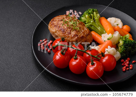 Delicious fresh fried minced fish cutlets with spices and herbs Delicious fresh fried minced fish cutlets with spices and herbs 105674779