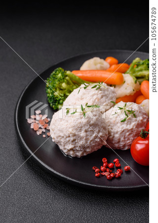 Delicious healthy steamed chicken cutlets or minced meatballs Delicious healthy steamed chicken cutlets or minced meatballs 105674789