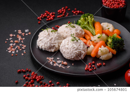 Delicious healthy steamed chicken cutlets or minced meatballs 105674801