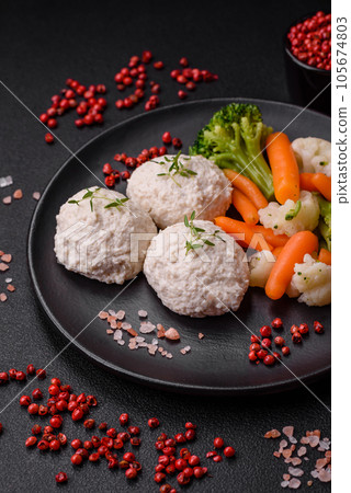 Delicious healthy steamed chicken cutlets or minced meatballs 105674803