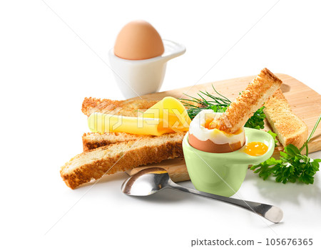 Soft boiled eggs with toast and cheese on breakfast Soft boiled eggs with toast and cheese on breakfast 105676365