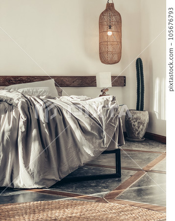 Loft style bedroom with gray bed linen set 105676793