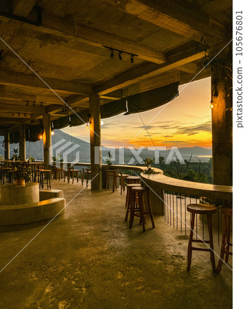 Empty cafe on sunrise with view on Batur volcano Empty cafe on sunrise with view on Batur volcano 105676801